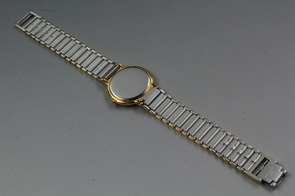 Near MINT Vintage Yves Saint Laurent 2200-228481 23mm Quartz Gold Dial Women's