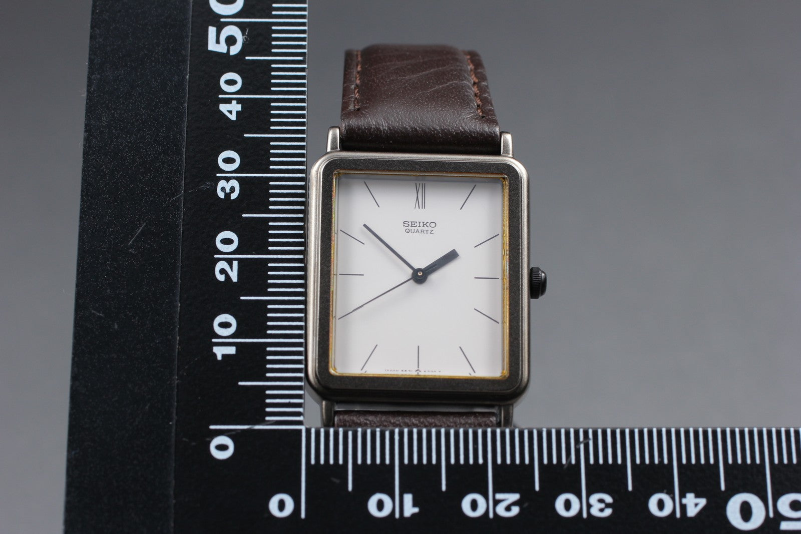 Vintage 1984 [NOS / Tag] Seiko Avenue 6531-5140 25mm Quartz White Roman Tank Men