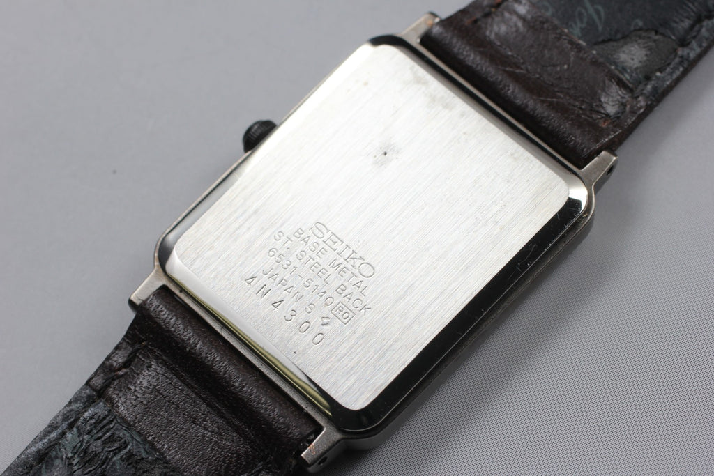 Vintage 1984 [NOS / Tag] Seiko Avenue 6531-5140 25mm Quartz White Roman Tank Men