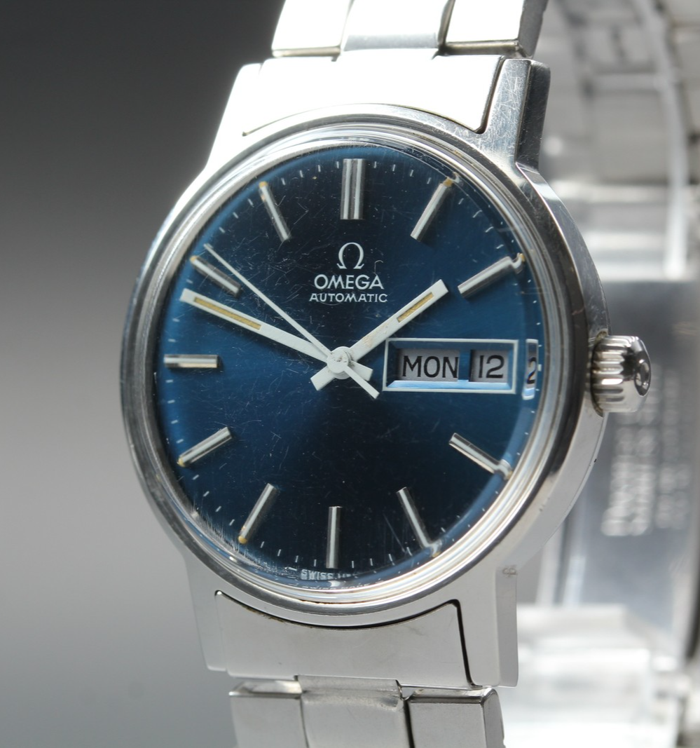 Vintage 1972 [Near MINT] Omega Geneve 166.0117 35mm Automatic Navy Dial Men's